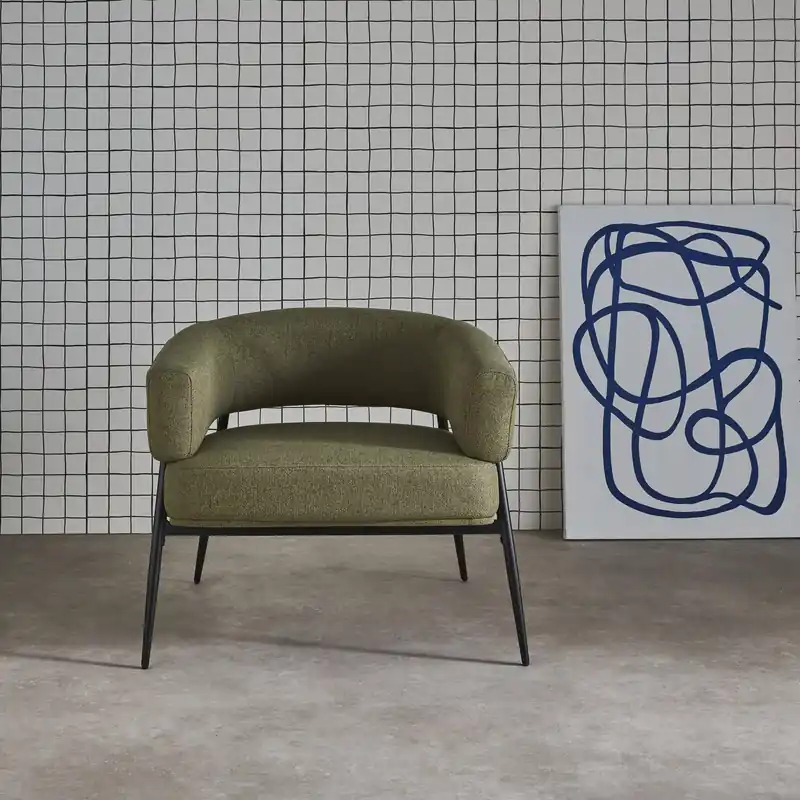 Sillón de tela con respaldo curvo y patas de metal - Sillones