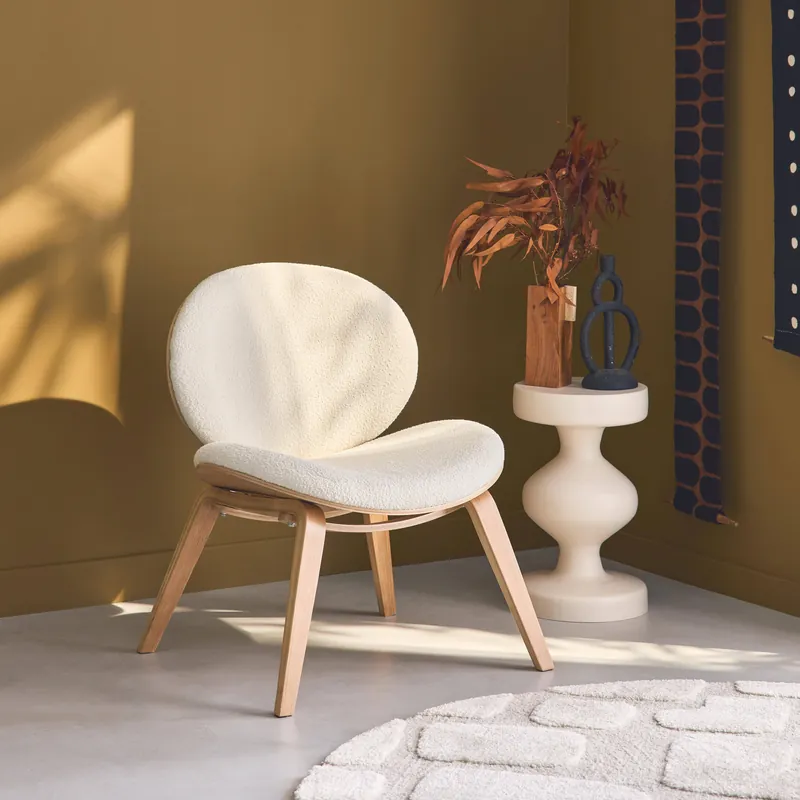 Sillón de madera curvada y borreguito - Sillones