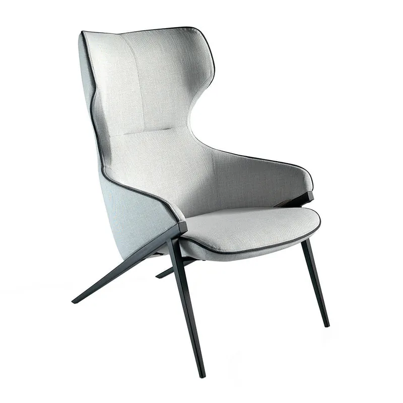 Sillón tapizado en tela con ribetes negros y patas de acero negro - Sillones