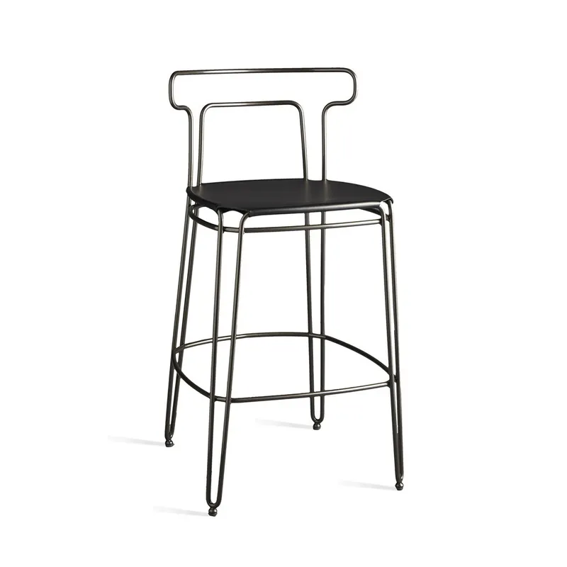Taburete Colico Jackie.ss con estructura de varillas y asiento tapizado en cuero. - Sala de estar