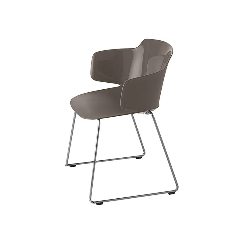 Elegante silla 1084 con reposabrazos de Et Al. Estructura de trineo de acero cromado y asiento de polipropileno. - Mueble de jardin